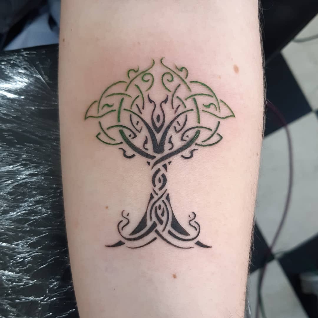 Elegant Celtic Tree Tattoo Design Captured on Skin Tattoo Design