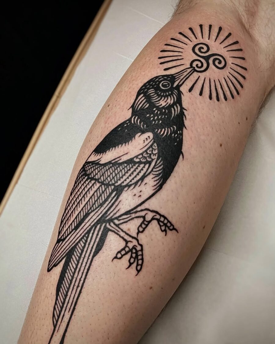 Intricate Celtic bird tattoo with sun symbolism Tattoo Design