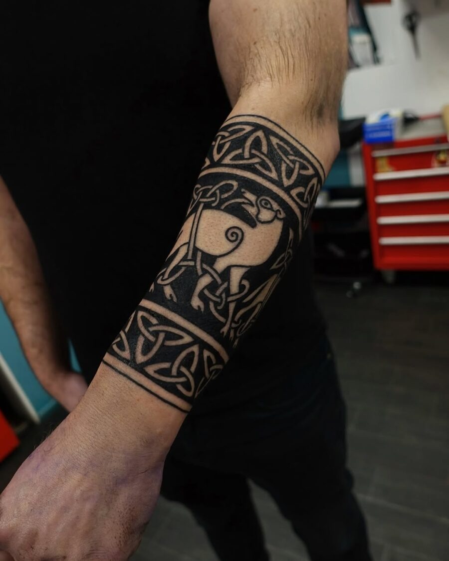Intricate Celtic designs featuring a sheep motif Tattoo Design