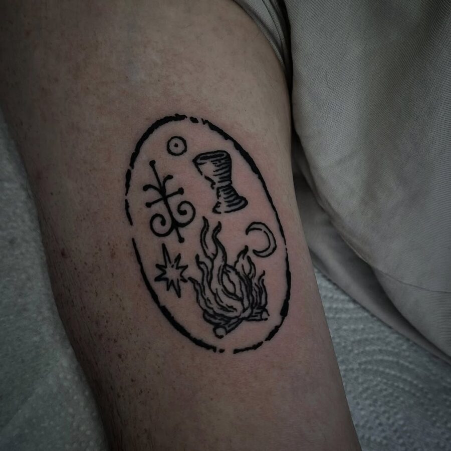 Intricate Celtic symbols in bold outlines Tattoo Design