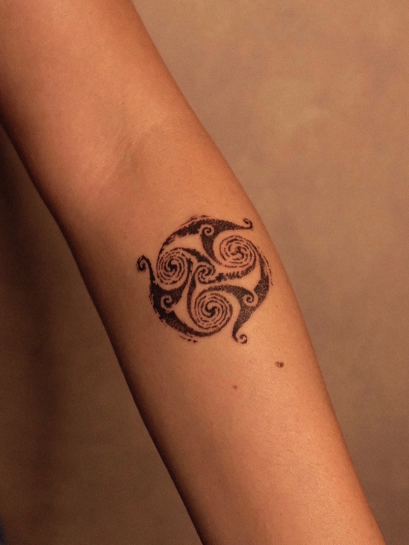 Intricate swirl pattern reflecting Celtic heritage Tattoo Design