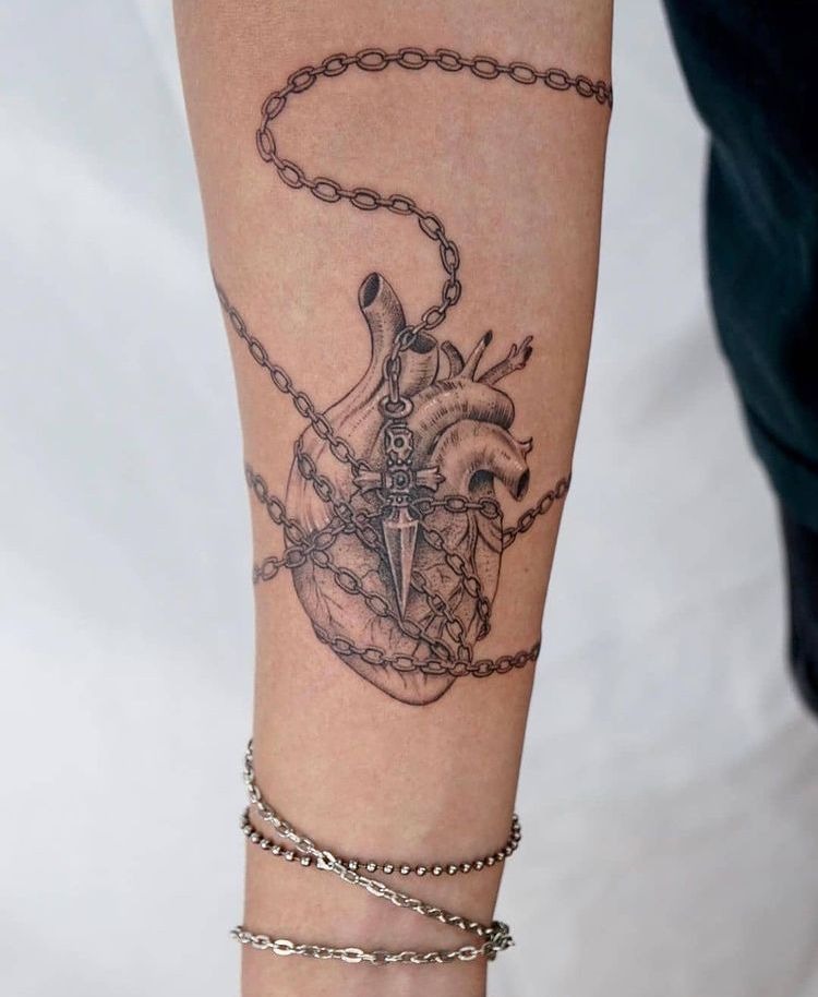 Anatomical Heart Wrapped in Chain Tattoo Design