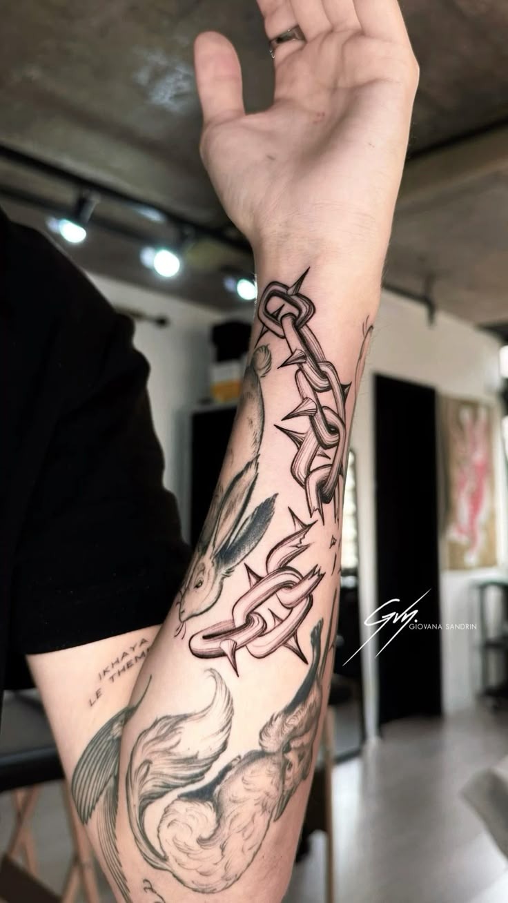 Breaking Chain with Light Burst Tattoo Design