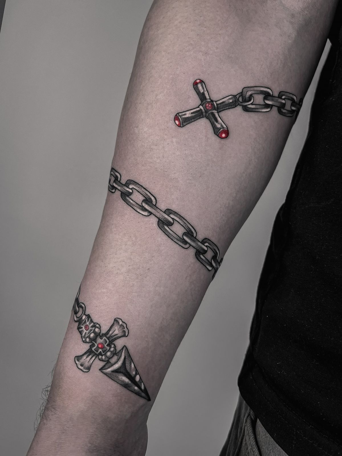 Chain with Dual Cross and Dagger Elements Tattoo Design
