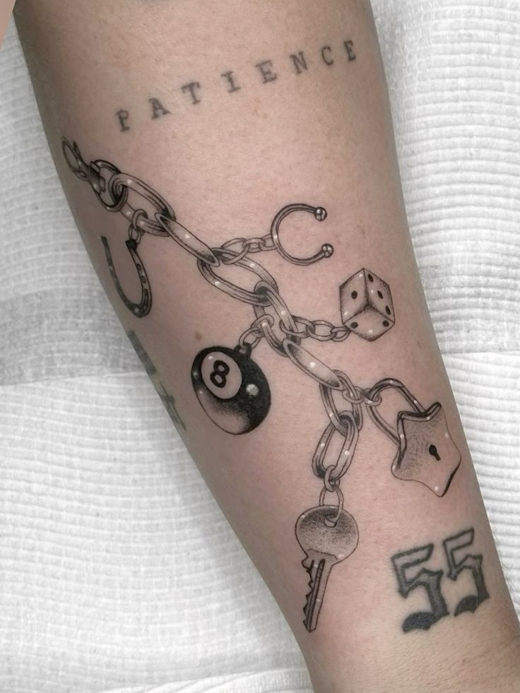 Charm Chain with Dice and Lock Tattoo Design