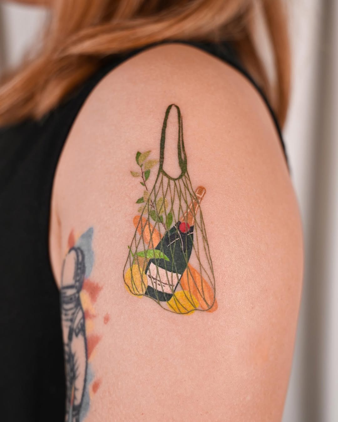 A stylish champagne tattoo in a mesh bag Tattoo Design
