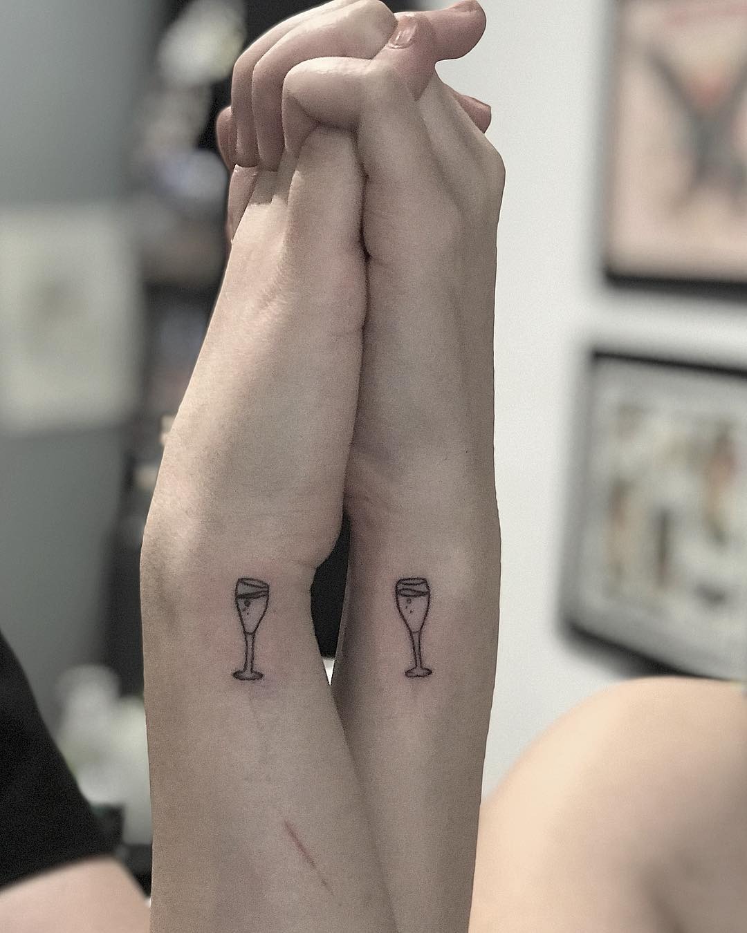 Charming champagne glass tattoos on arms Tattoo Design
