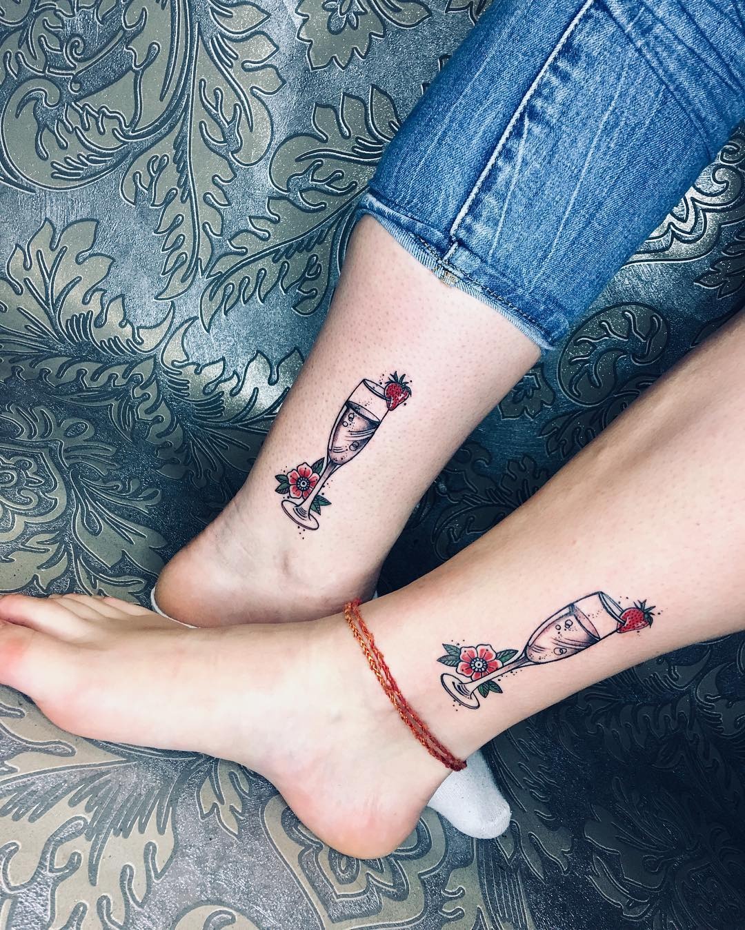 Elegantly designed champagne flute tattoos with flowers Tattoo Design