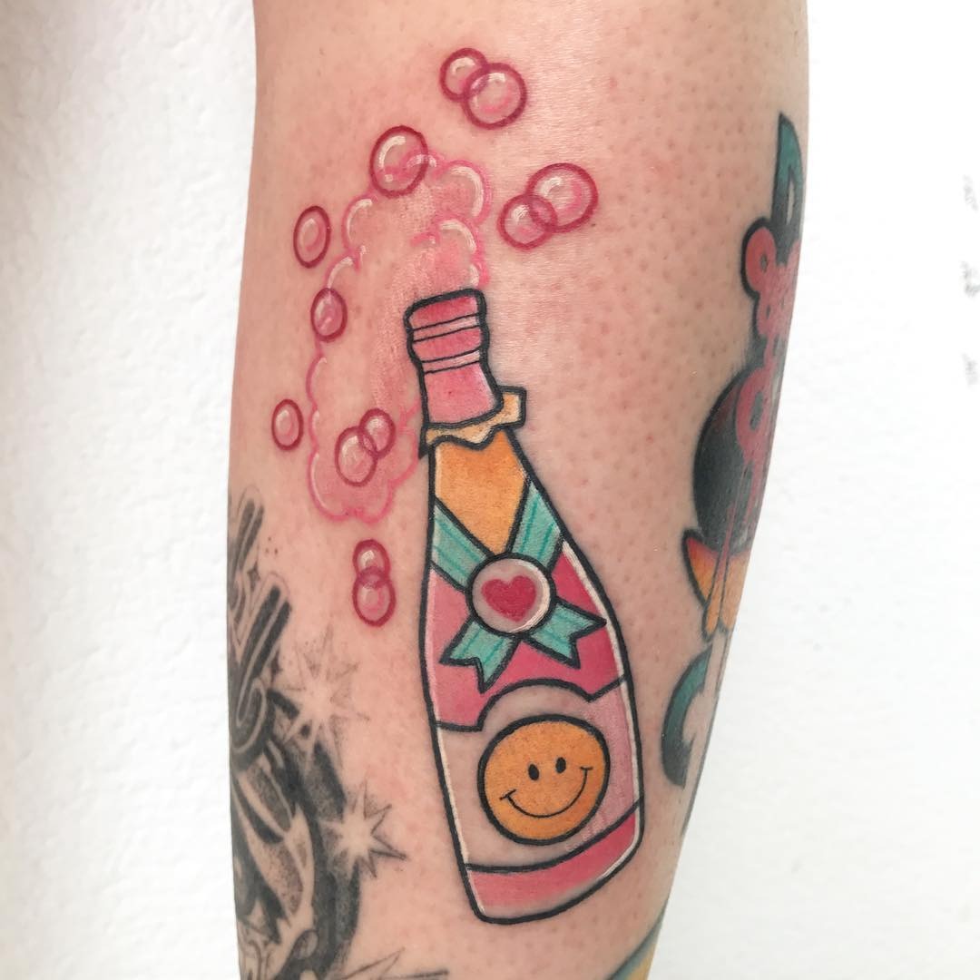 Vibrant champagne bottle with cheerful bubbles Tattoo Design
