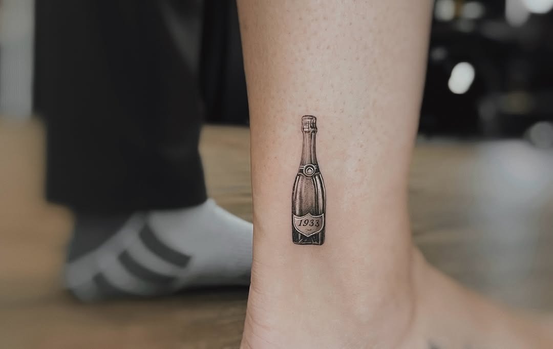 Vintage champagne bottle tattoo with elegant details Tattoo Design