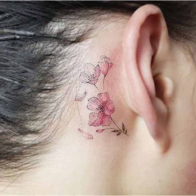 The Behind-the-Ear Blossom Branch Tattoo Design