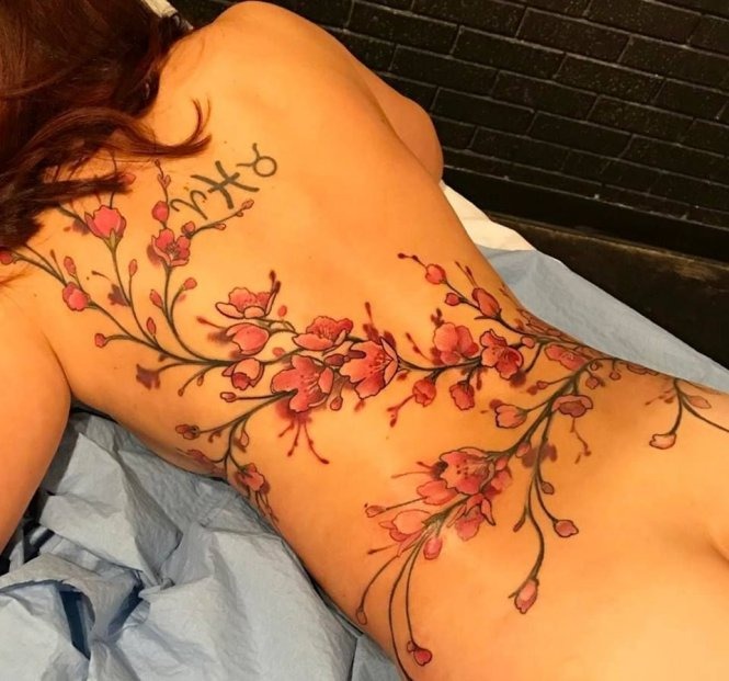 The Cherry Blossom Tattoo Branch Wrap-Around Tattoo Design