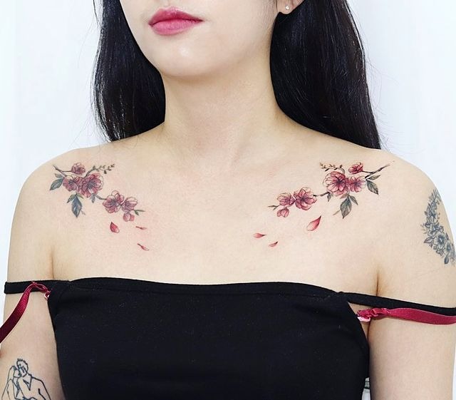 The Delicate Collarbone Cherry Blossoms Tattoo Design
