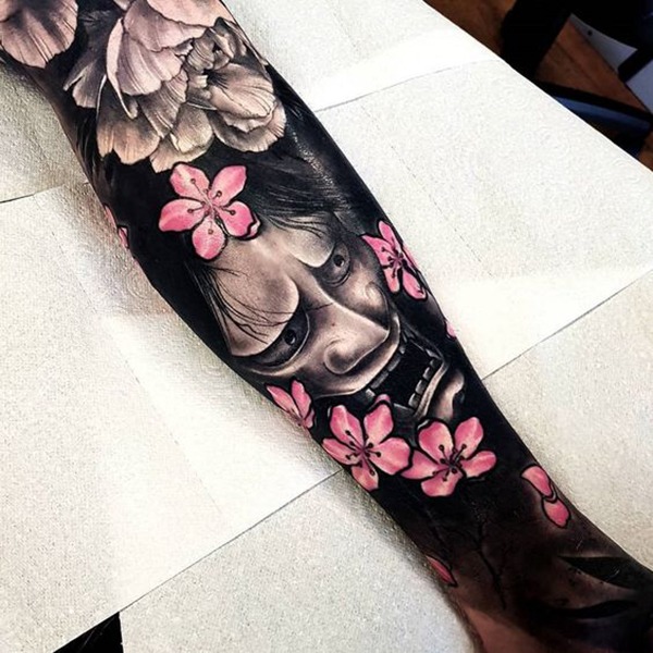 The Downcast Face and Bright Blossoms Tattoo Design