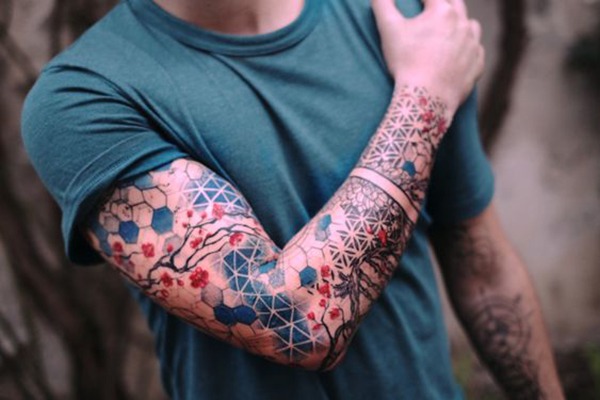 The Geometric-Backed Flower Design Tattoo Design