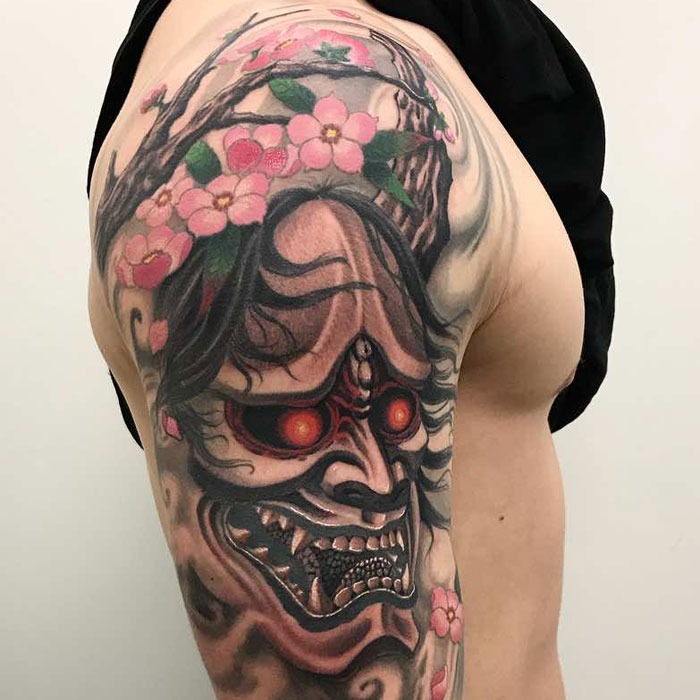 The Glowing Skull with Cherry Blossom Crown Tattoo Design
