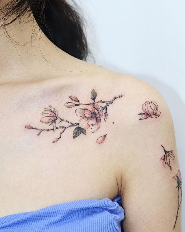 The Pale Pink Cherry Blossom Branch Tattoo Design