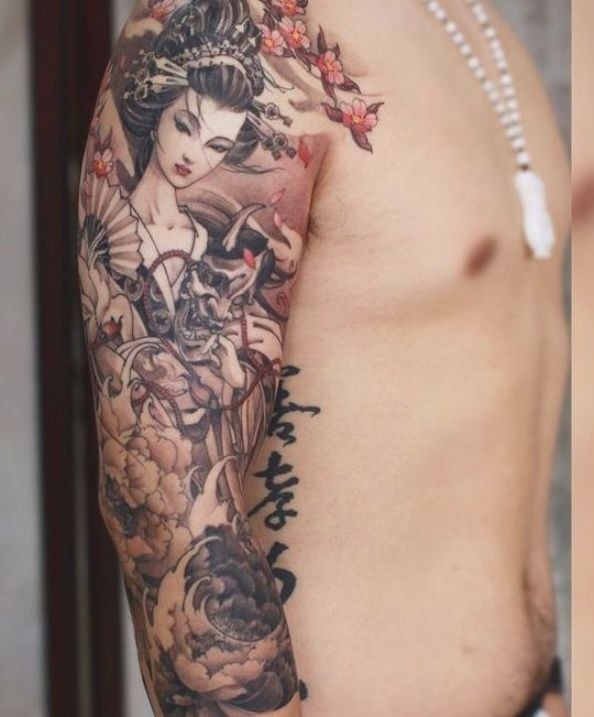 The Serene Geisha Atop the Waves Tattoo Design