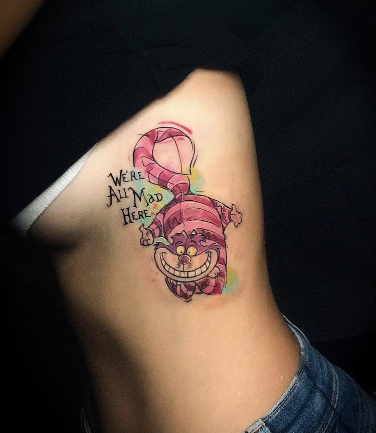 Upside-Down Cheshire Cat Rib Tattoo Tattoo Design