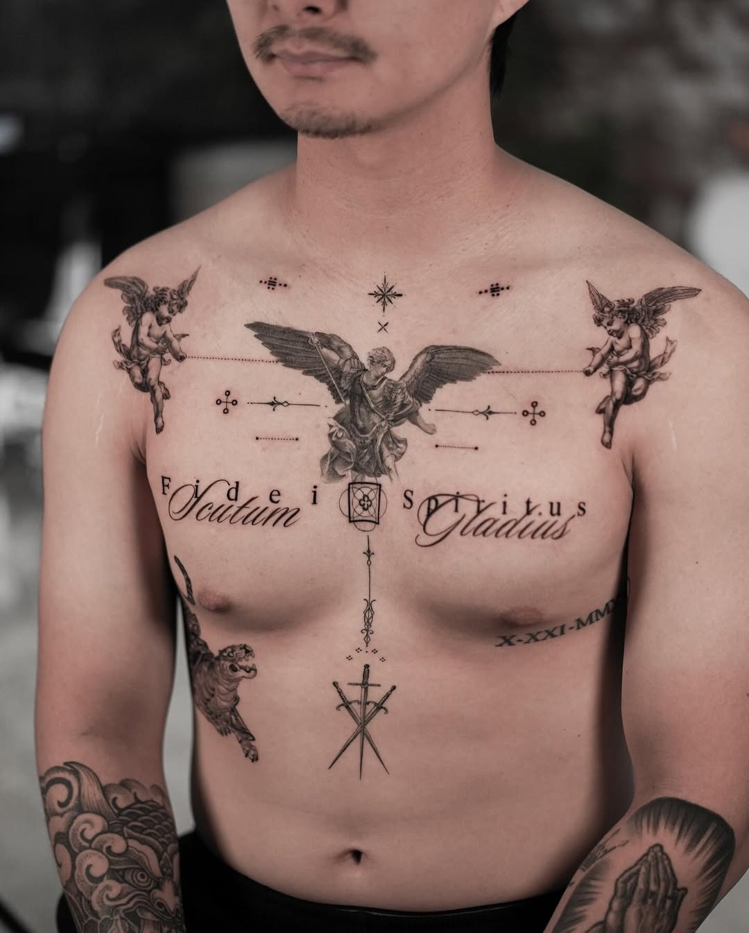 Bold Angelic Chest Tattoo with Intricate Details Tattoo Design