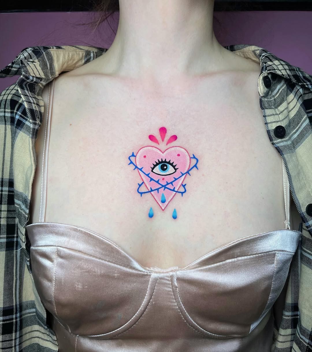 Colorful heart and eye chest tattoo design Tattoo Design
