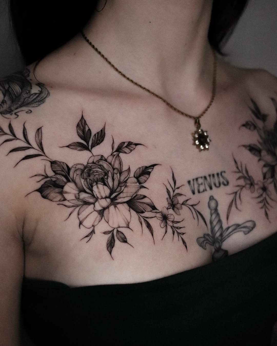 Elegant floral design with a Venus inscription Tattoo Design