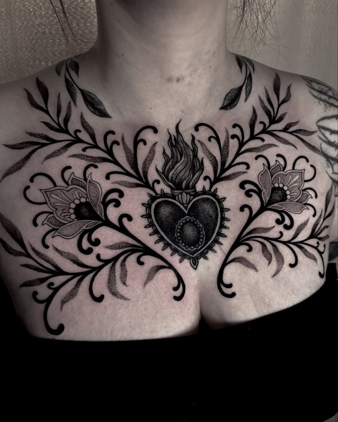 Elegant heart and floral chest tattoo design Tattoo Design