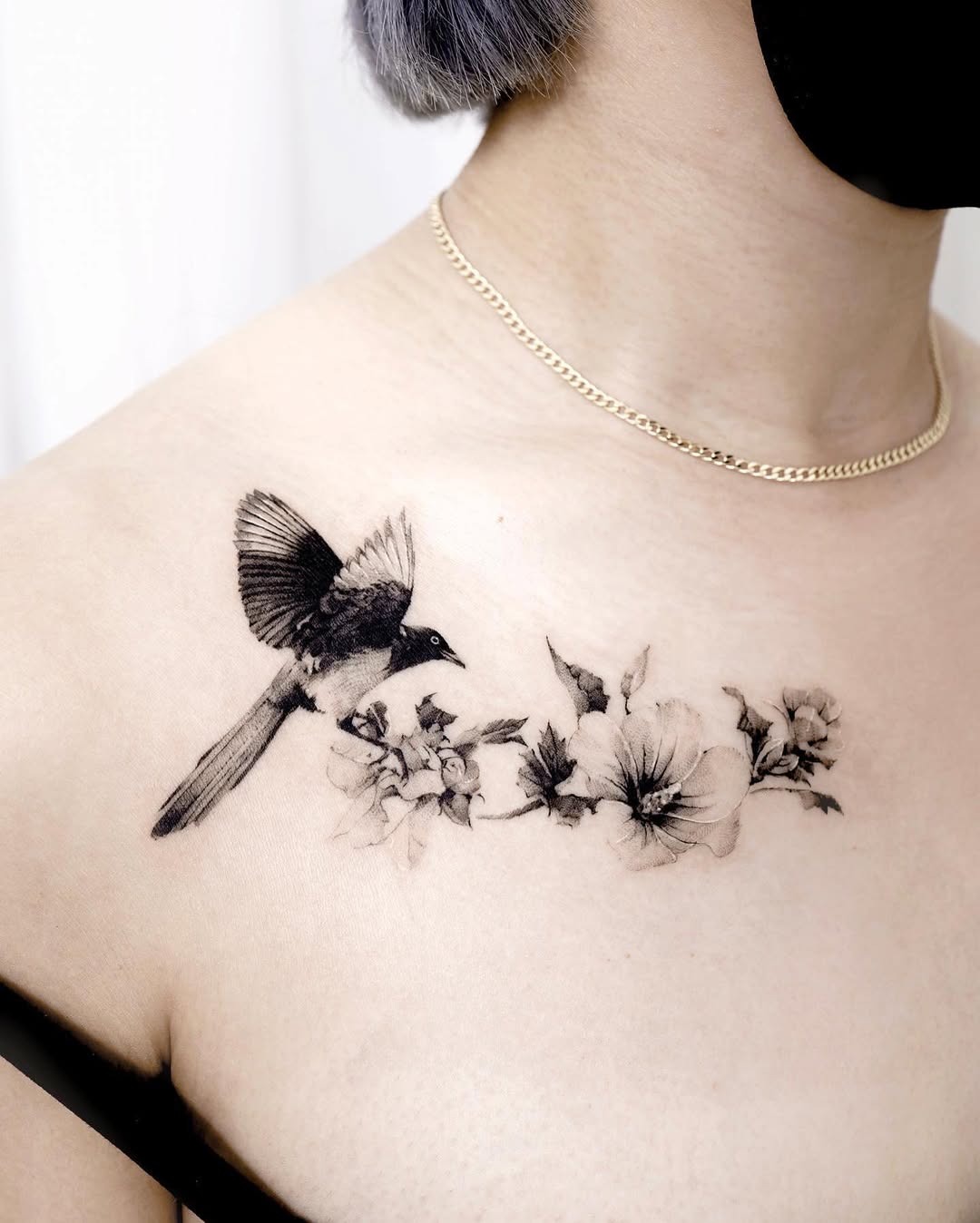 Intricate bird and floral chest tattoo design Tattoo Design