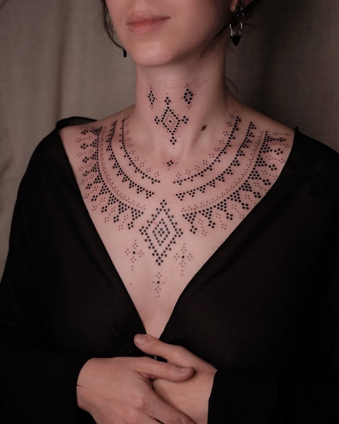 Intricate dotwork chest tattoo design Tattoo Design