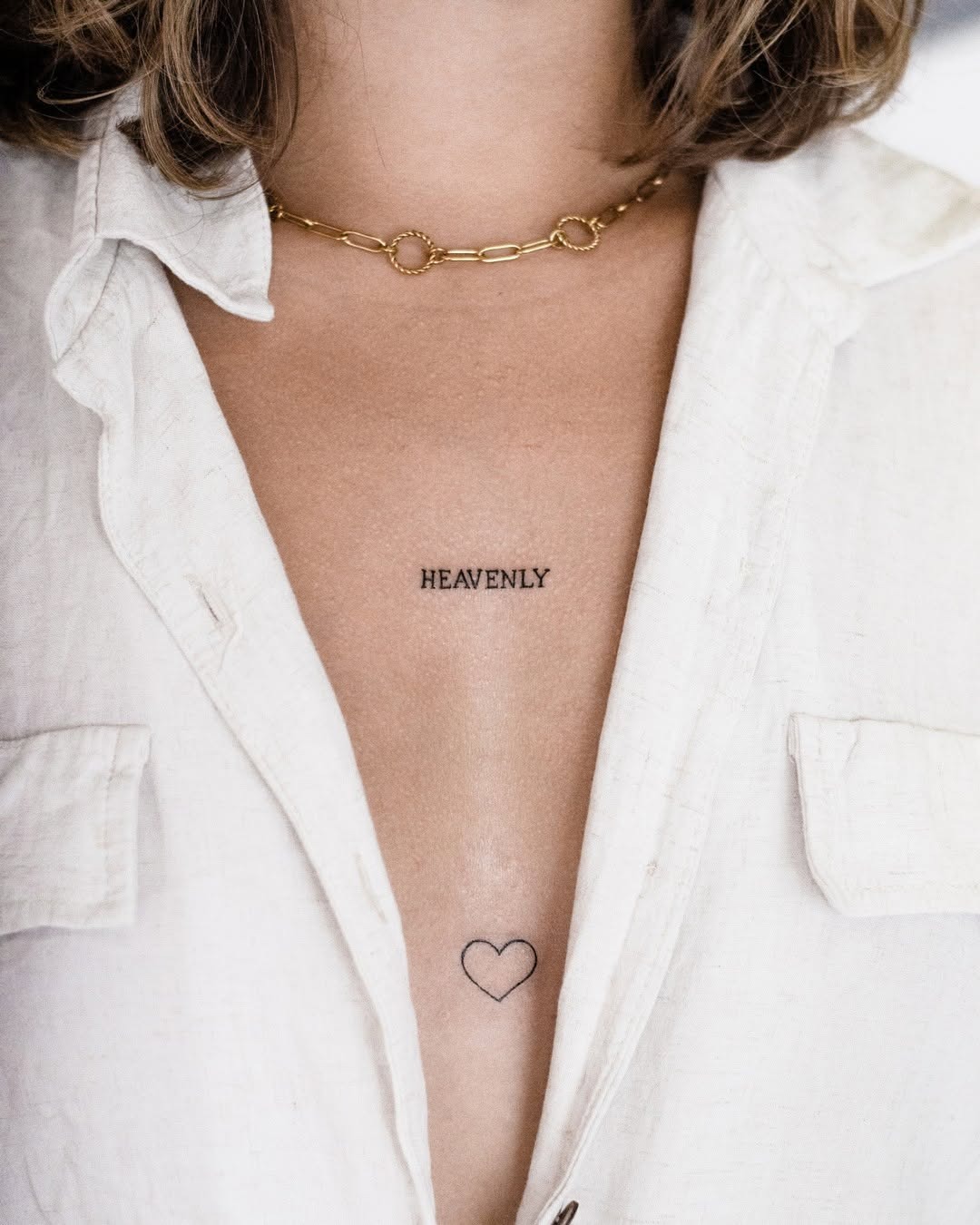 Minimalist chest tattoos with elegant vibes Tattoo Design