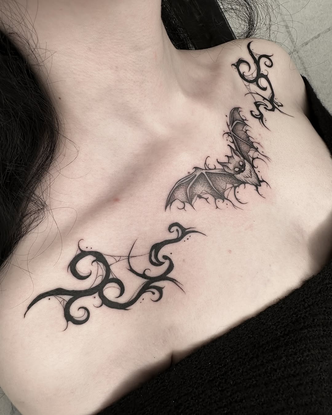 Striking bat and tribal chest tattoos Tattoo Design