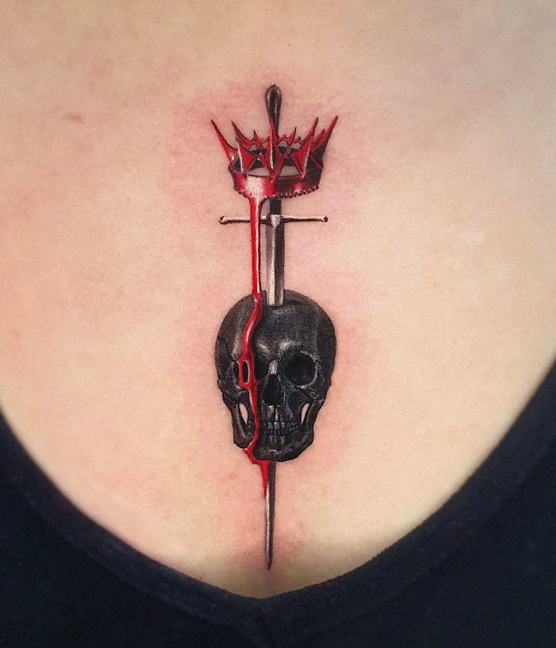 Striking skull and dagger chest tattoo design Tattoo Design