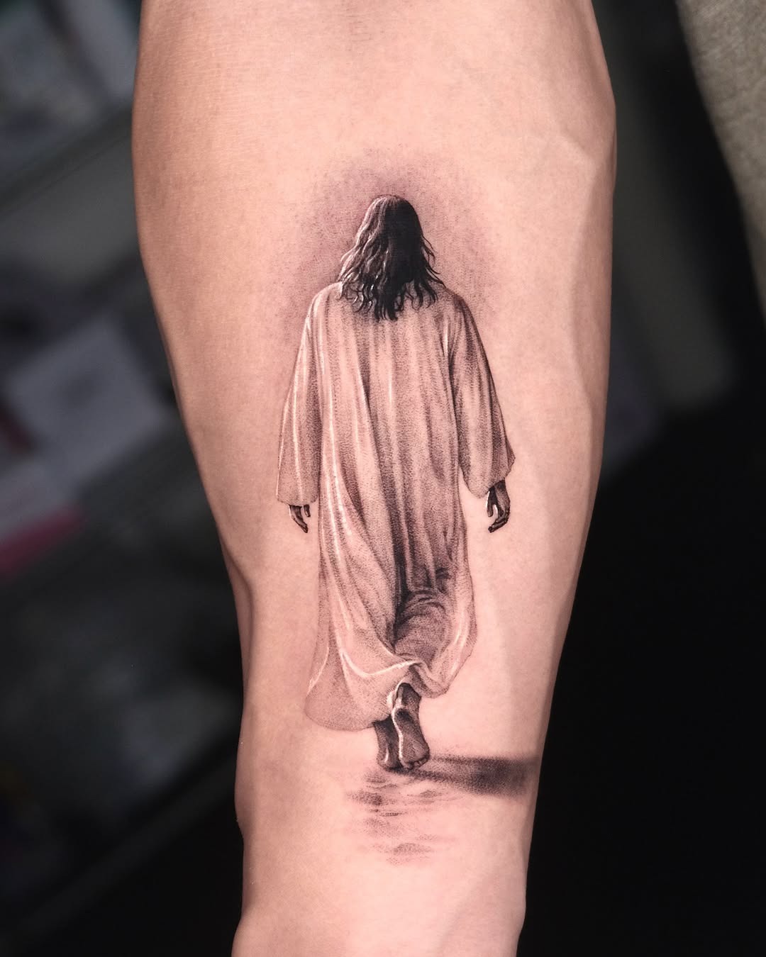 A beautiful depiction of Jesus in motion Tattoo Design