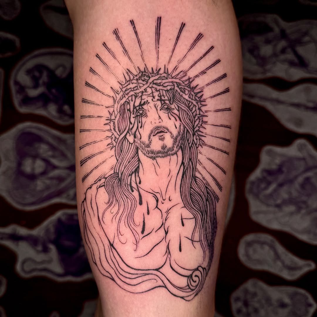 A striking representation of faith and sacrifice Tattoo Design