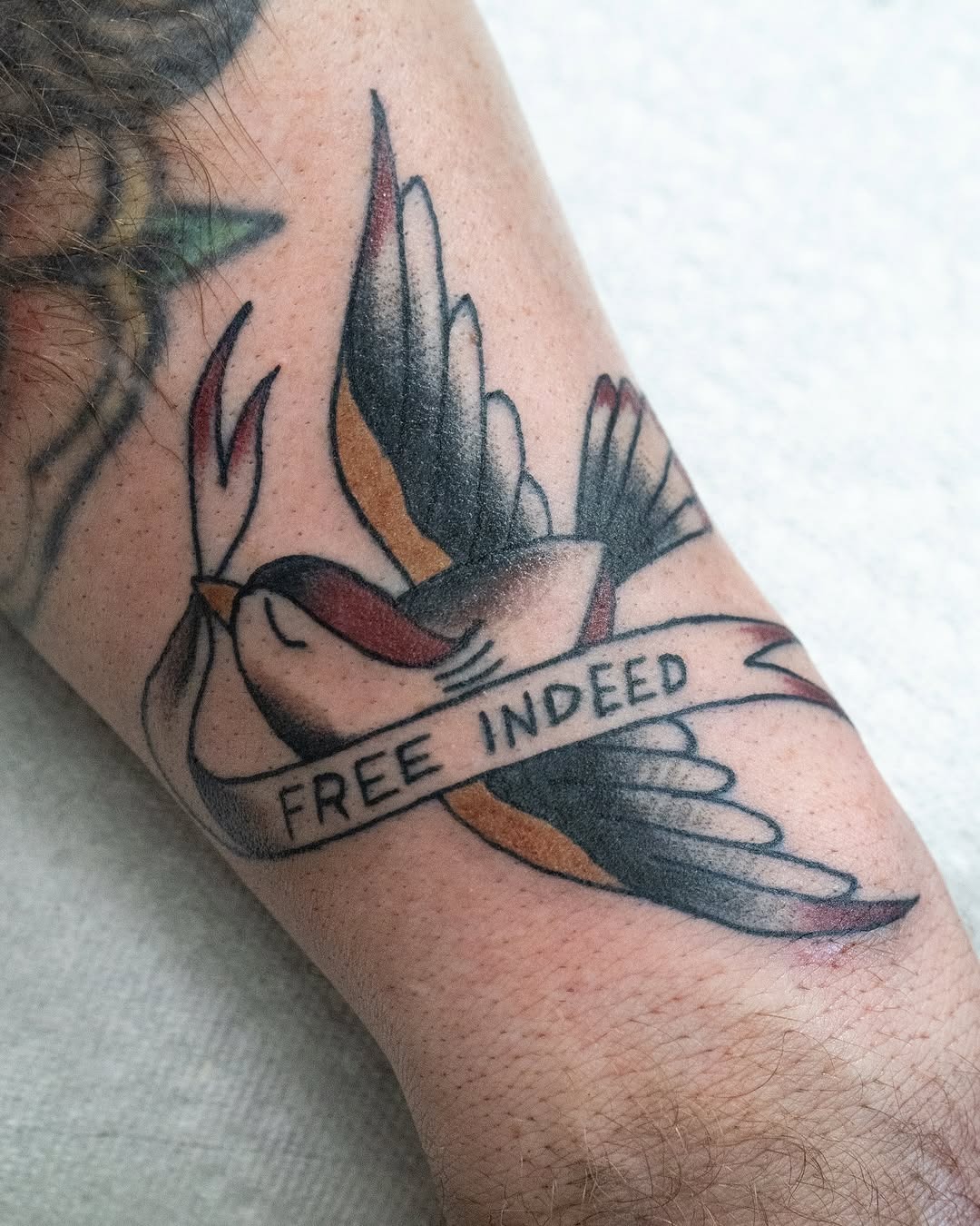Elegant tattoo symbolizing freedom and faith Tattoo Design