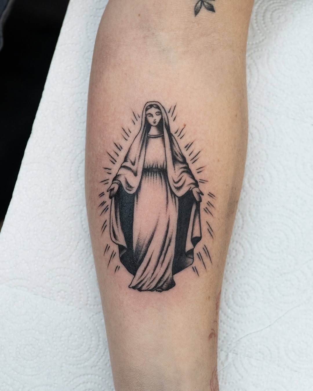 Elegant Virgin Mary Tattoo with Radiant Aura Tattoo Design