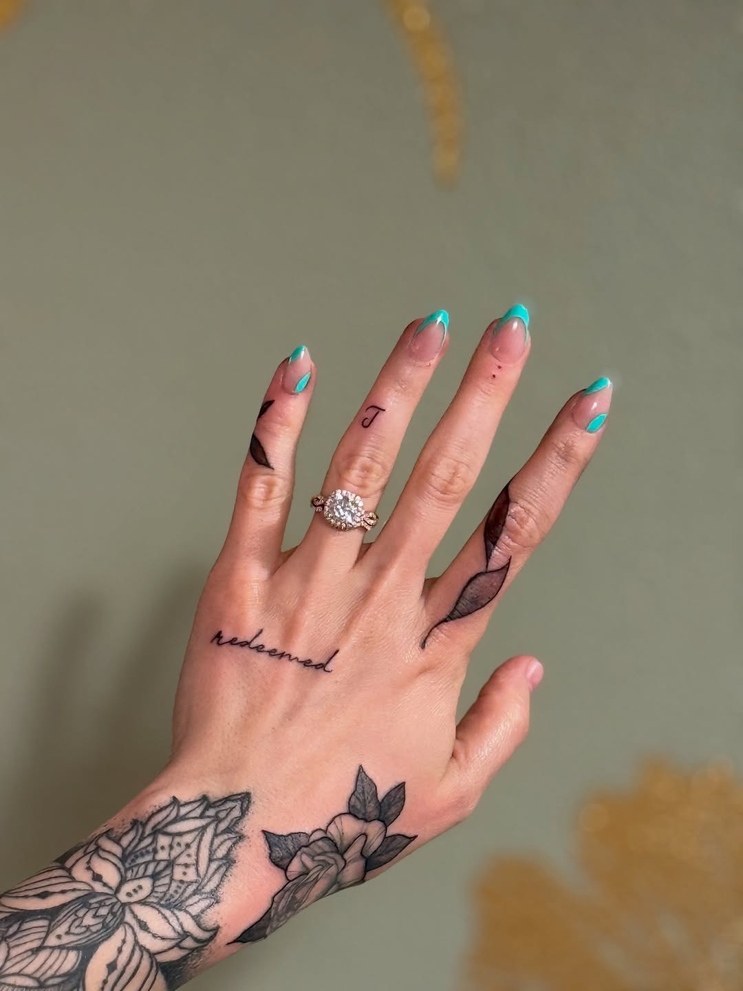 Intricate Christian tattoos on a hand Tattoo Design