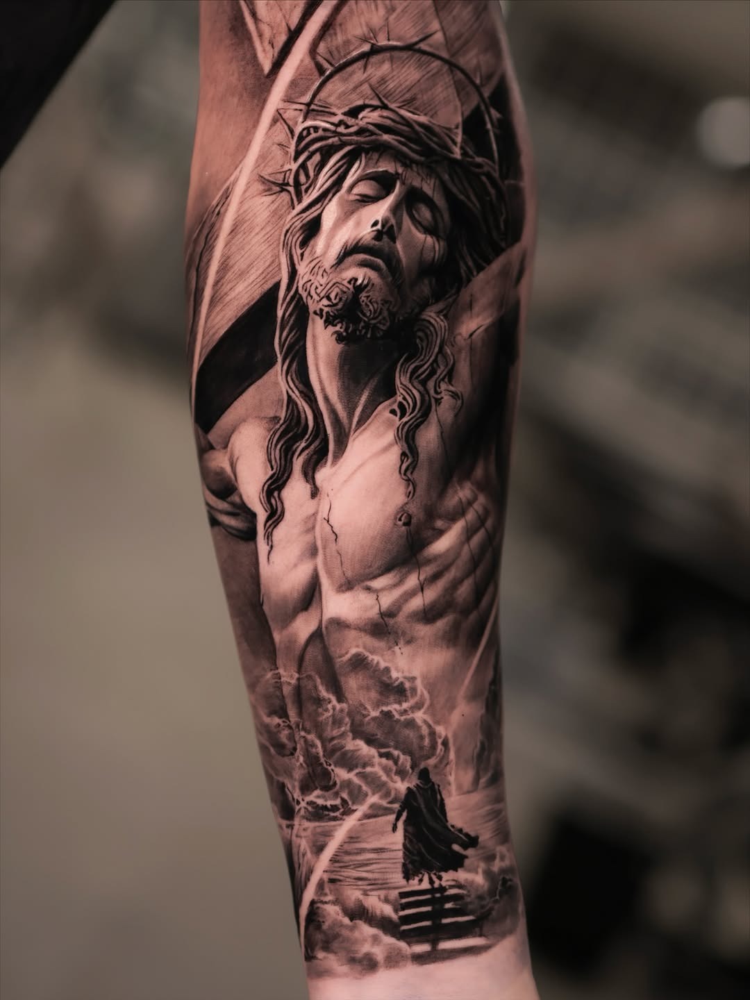Striking depiction of Christ on the cross Tattoo Design