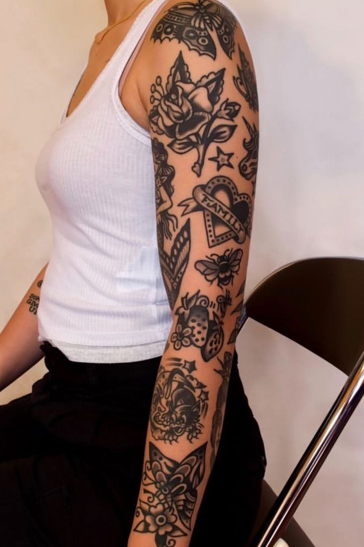 Classic Black Patchwork Story Sleeve Tattoo Design