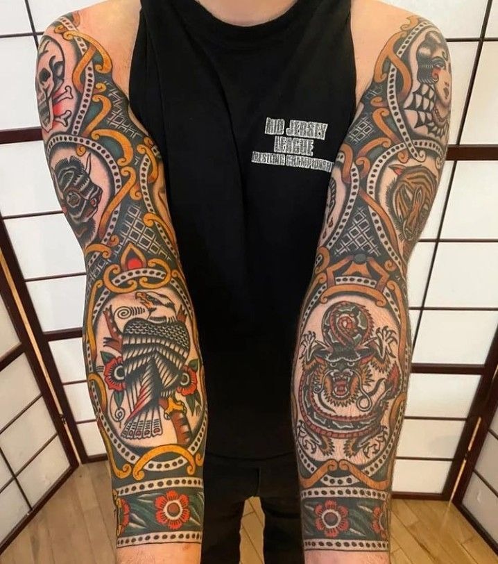 Ornate Framed Traditional Sleeve Tattoo Design