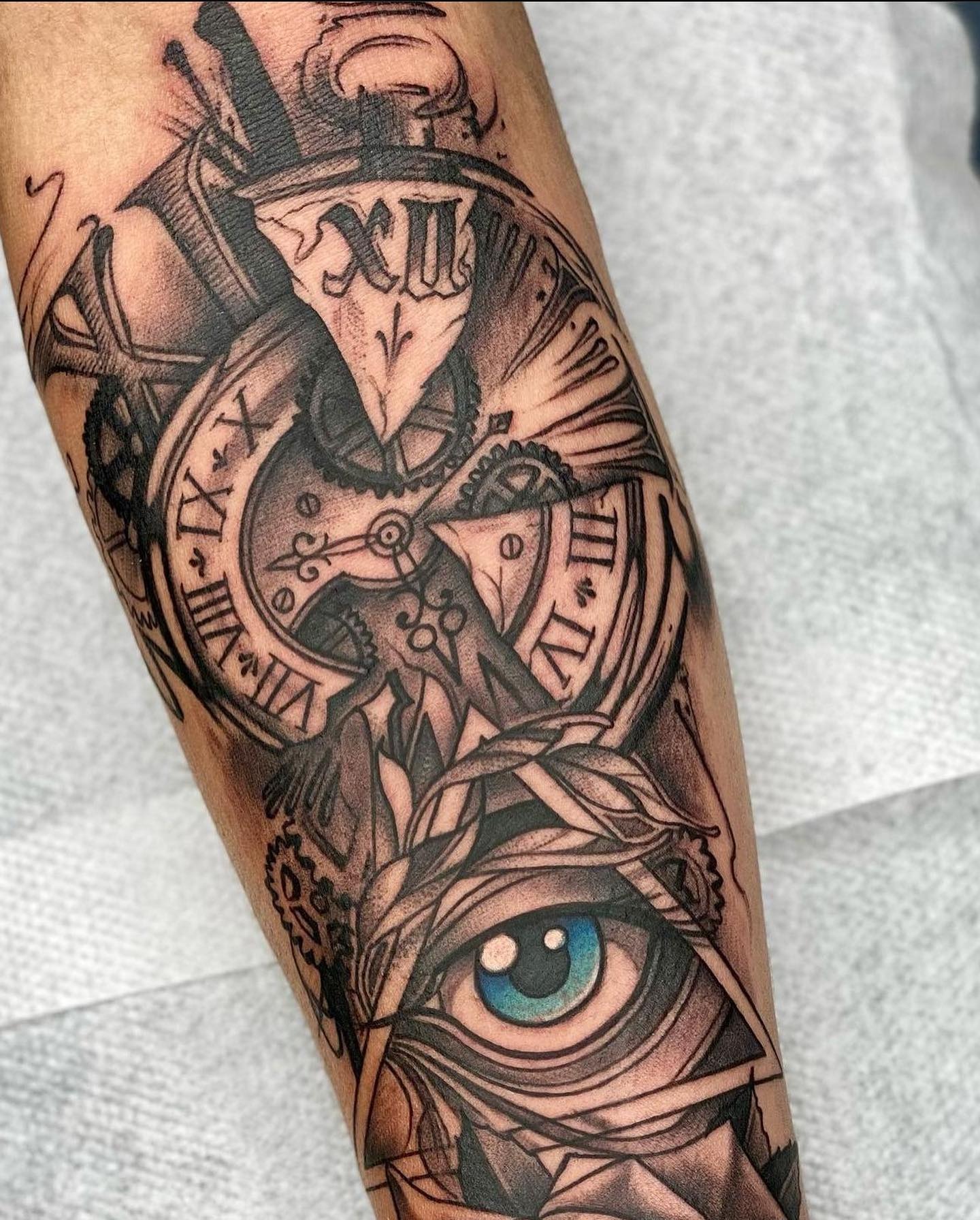 Broken Clock and Blue Eye Tattoo Tattoo Design