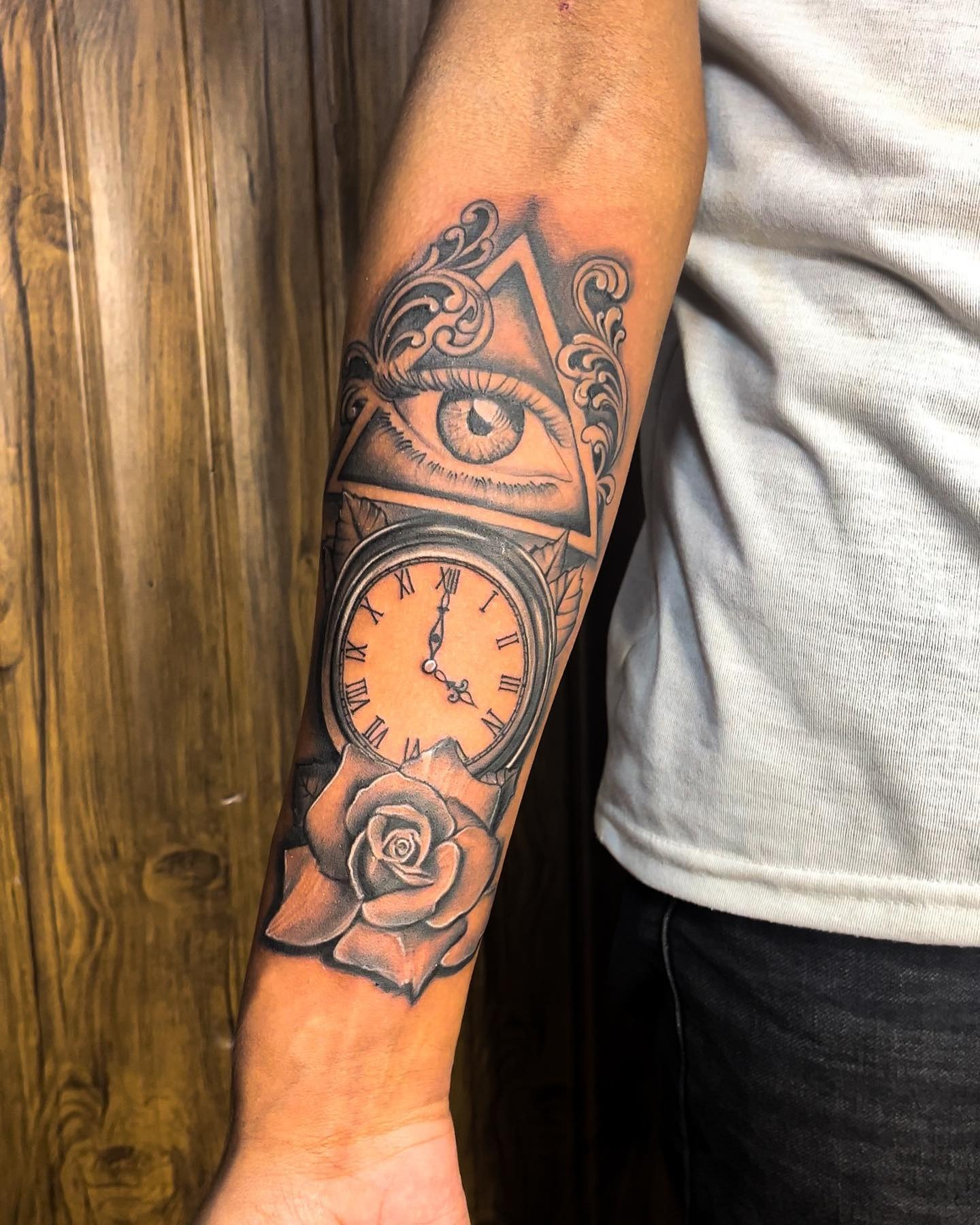 Eye and Clock Tattoo With Rose Tattoo Design