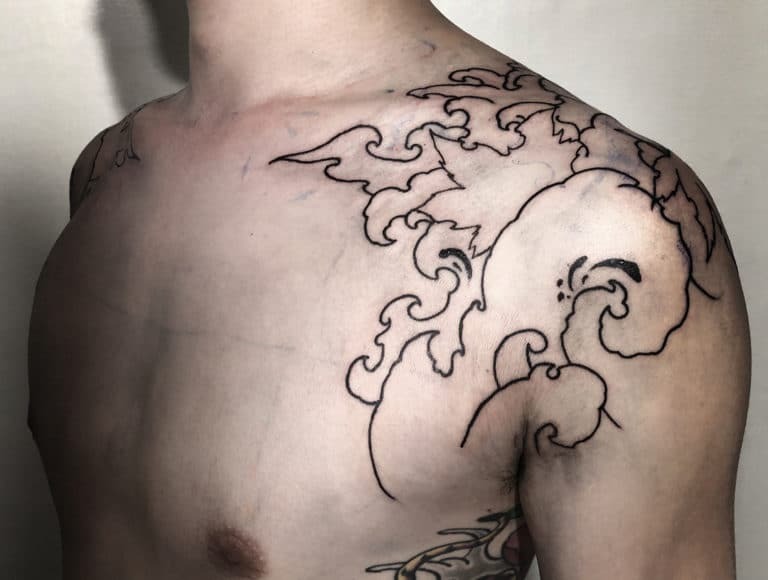 A GreatFriendship Tattoo: Black and White Swirling Clouds Chest Tattoo Tattoo Design