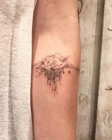 Billowy Cloud Tattoos with Ornamental Rain Drops Tattoo Design