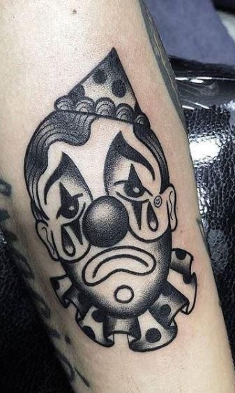Heart-Framed Harlequin Figure Tattoo Design
