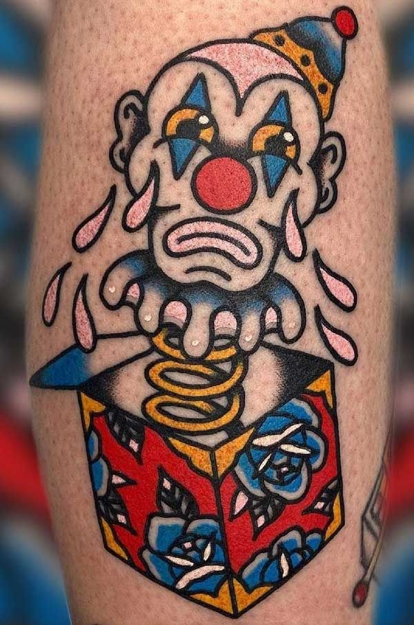 Sunflower-Eyed Blackwork Clown Face Tattoo Design