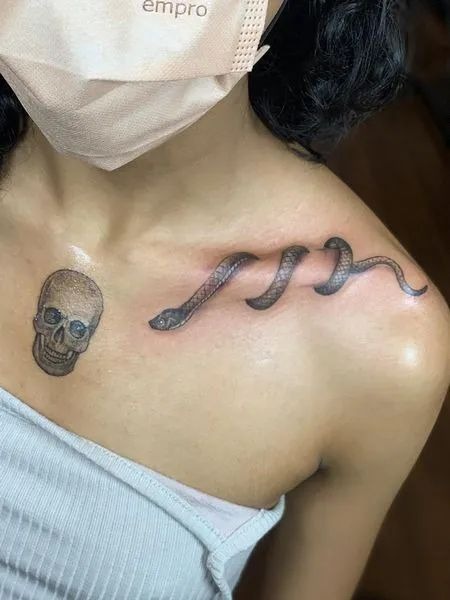Snake Across the Collarbone Tattoo Design