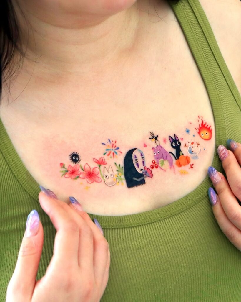 A whimsical and collarbone tattoo featuring beloved characters surrounded by colorful floral accents and playful patterns.