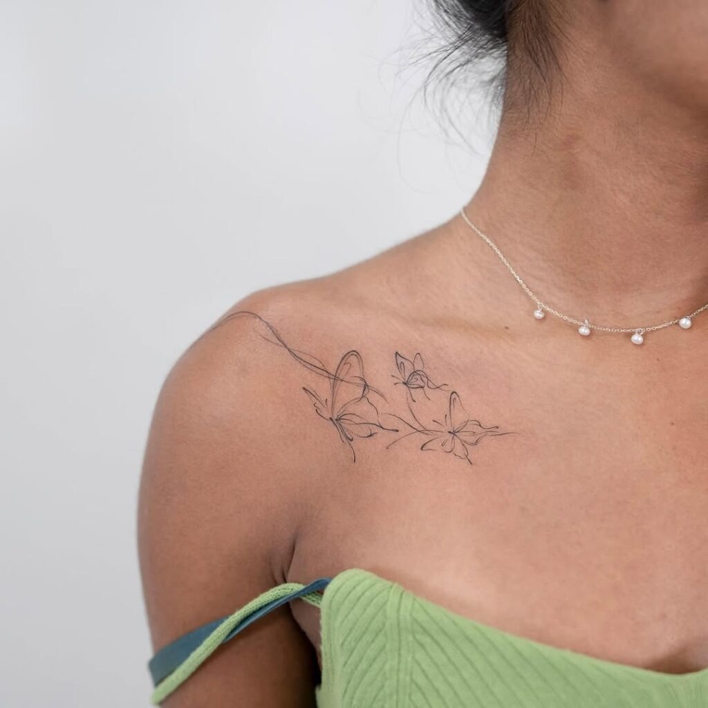 The design centers on delicate butterfly imagery that reads clearly at a glance.