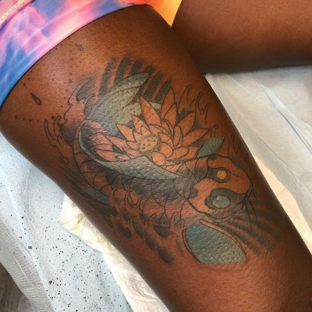 Thigh Tattoo with Bold Color Palette tattoo design